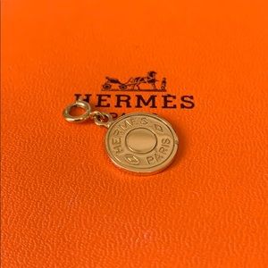 Hermes coin charm